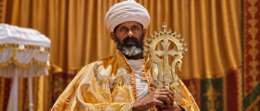 Ethiopian Orthodox church cross carried by a priest — Ethiopian gold cross in procession, Coptic cross tradition