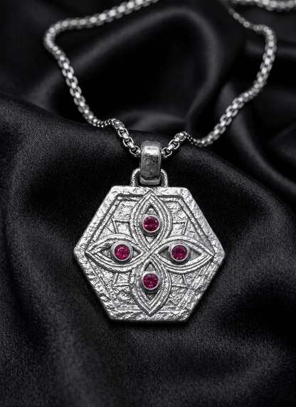 White gold shield pendant with ruby watchers, protection jewelry in the scroll tradition
