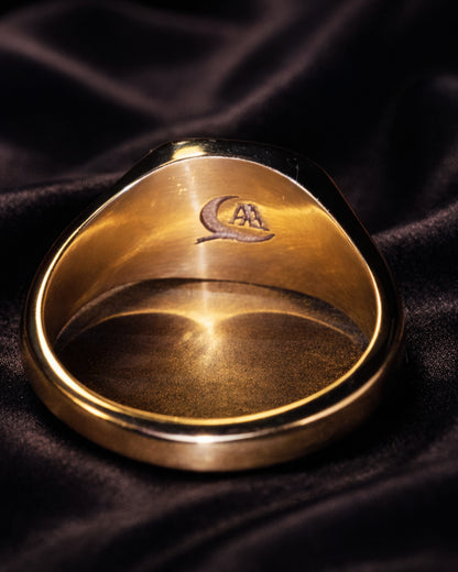 Back of the solid 18k gold signet with maker's mark, signet ring jewelers craftsmanship