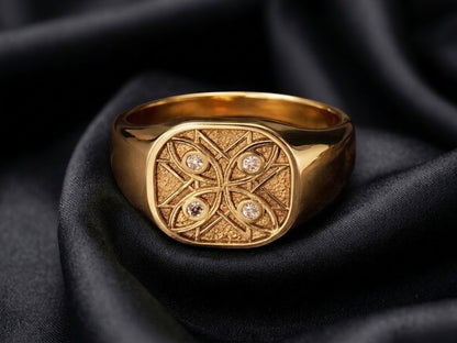 Gold signet ring in solid 18k with four diamond watchers, healing scroll face on black silk