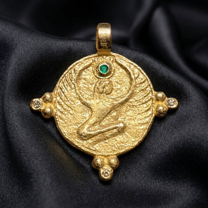 Eternal Mother Pendant in solid 18k gold with emerald crown stone, egyptian jewelry winged Isis disc
