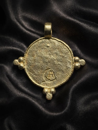 Back of the solid 18k gold goddess disc with maker's mark and engraving space, Egyptian gold jewelry