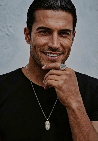 Man wearing the white gold Bereka tablet on chain, men's African jewelry styled simply