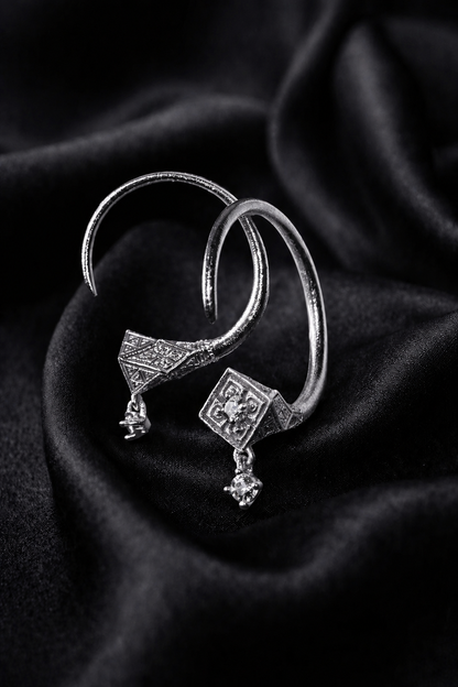 White gold Tuareg hoops with diamond drops on silk, north African jewelry in 18k