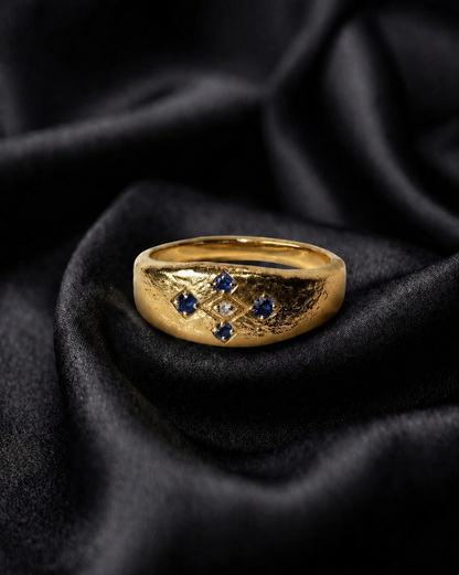 Gold Meskel ring with blue sapphires, the Ethiopian coptic cross lattice in 18k