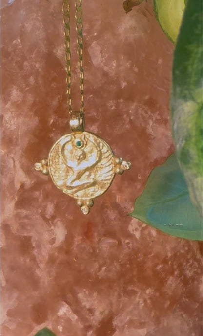 Video of the gold winged goddess pendant on rose stone, an Isis necklace with green crown stone