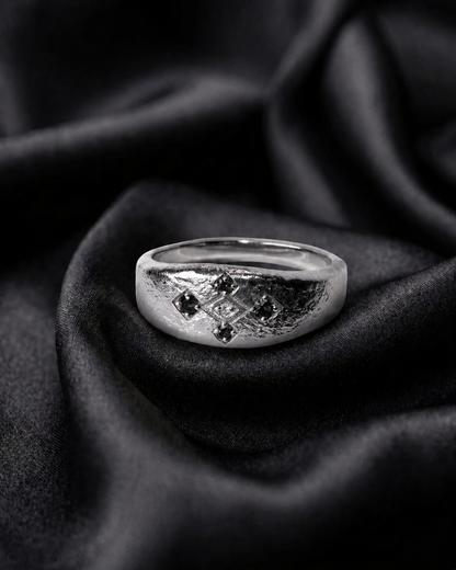 White gold Meskel with black diamonds, a boho ring in rough cast finish