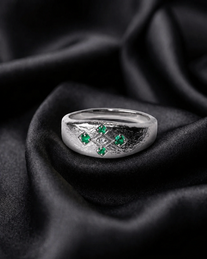 White gold Meskel with emerald prongs, heirloom jewelry in continuous line lattice