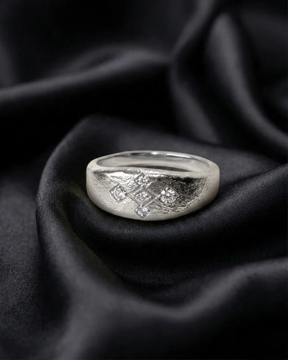White gold Meskel ring with diamond prongs on silk, coptic cross jewelry cut in the metal